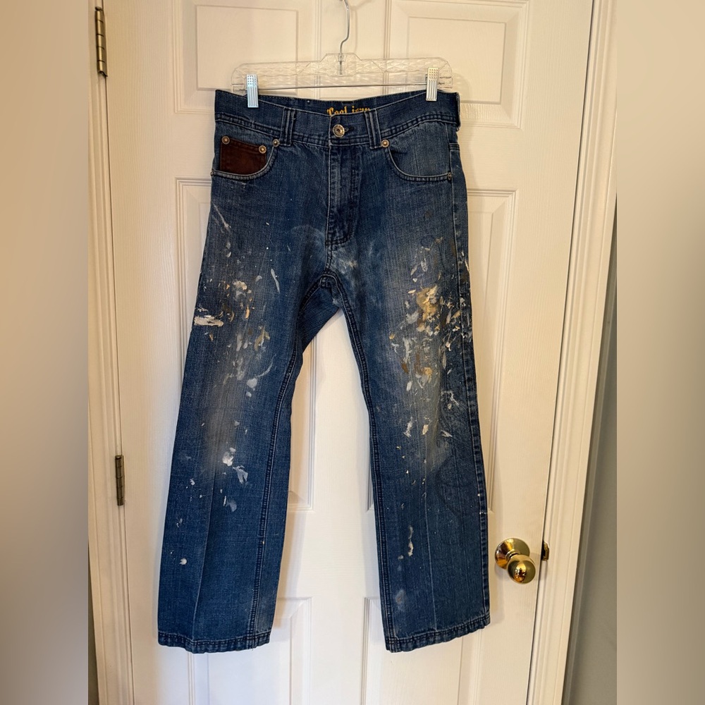 Blue Denim Jeans with Brown Pocket and Paint Splatter